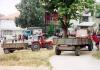 10.Tractors waiting to deliver the aid to the surrounding villages
